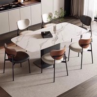 Chaise de salle à manger minimaliste italienne en acier avec revêtement en cuir, design nordique moderne, dossier vintage pour la maison, l'hôtel et le café