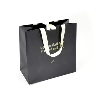 Sacs en papier décoratifs faits à la main avec impression personnalisée de haute qualité avec logo fournisseur doré sacs en papier à fond pincé