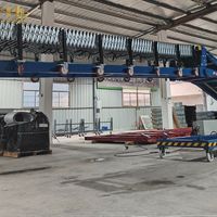 Chargeur de camions télescopique robuste avec hauteur réglable et propulsion motorisée pour un déchargement rapide des conteneurs