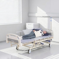 Lit d'hôpital manuel à manivelle, avec plateau réglable en ABS, barrière latérale semi-pliable et roulettes avec frein, pour usage à domicile