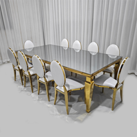 Ensemble de table à manger rectangulaire avec plateau en verre miroir et base en acier inoxydable doré