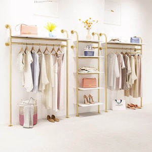 Listo para enviar, estante de ropa de Metal bonito a la moda, estante de ropa montado en la pared dorado de acero inoxidable para exhibición de <span class=keywords><strong>tienda</strong></span> de mujeres Boutique - Product Image 2