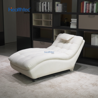 Fauteuil à bascule ergonomique avec coussin moelleux, structure en bois/métal, chaise à bascule de détente pour salon, chambre, balcon