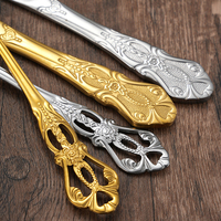 Ensemble d'argenterie en acier inoxydable au design sculpté en creux couteau fourchette cuillère ensemble de couverts en or baroque antique pour mariage