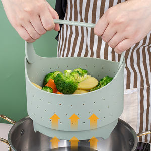 Vaporizador de <span class=keywords><strong>silicona</strong></span> de grado alimenticio y cesta de verduras con logotipo personalizable, utensilios de cocina plegables y resistentes al calor para cocinar al vapor - Product Image 1
