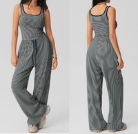 Nouvel ensemble de vêtements de sport pour femmes, haut de sport à rayures et pantalon évasé, vêtements de fitness, yoga, 2 pièces