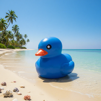 Ballon géant publicitaire personnalisé en forme de dessin animé animal, canard jaune ou bleu flottant avec ventilateur intégré pour la publicité