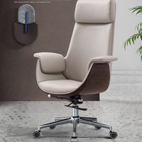 Chaise de bureau de direction moderne de luxe, ergonomique, inclinable à 90-125 degrés, pivotante, en cuir PU, avec finition imitation bois
