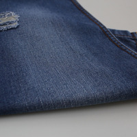 La mode ressemble à un tissu en denim lisse au toucher en coton polyester de 11.5oz