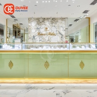 Présentoir à bijoux îlot en aluminium de qualité supérieure, vitrine de comptoir pour bijouterie dorée