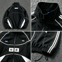 Maßgefertigte Reflektierende Streifen Farbblockierung Outdoor Techwear Wasserdichte Windjacke Schwarze Streetwear Wanderjacke für Herren Gorpcore-Stil