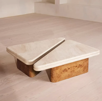 Table basse créative en travertin et placage de bois de burl, design moderne, texture naturelle pour salons et espaces latéraux.