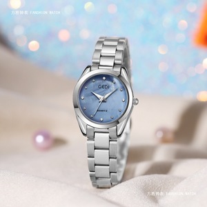 Reloj de pulsera de cuarzo elegante con esfera redonda y marcadores de cristal de acero inoxidable plateado para mujer - Product Image 5