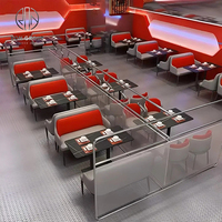 Ensemble de meubles de restaurant, café et bar moderne, tables à plateau foncé et chaises à dossier rouge et assise grise, durable et complet pour la salle à manger