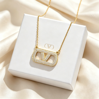 Nouveauté, bijoux de luxe en acier inoxydable entièrement sertis de diamants, marques de créateurs célèbres, collier et boucles d'oreilles en forme de lettre V pour femmes