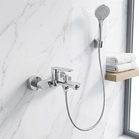 Ensemble de douche mural rond en laiton noir avec douchette à main et cartouche céramique pour hôtels et villas, idéal pour baignoire et robinetterie de salle de bain