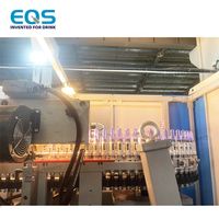 Machine de soufflage de bouteilles en plastique entièrement automatique 24000BPH pour eau, jus, boissons gazeuses, PET, machine de fabrication de bouteilles, usine de moulage par étirage-soufflage pour combi