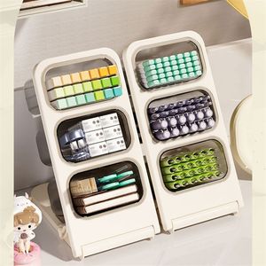 Boîte de rangement de bureau en plastique, idéale pour la rentrée scolaire, organiseur de stylos incliné à trois niveaux, simplicité moderne, pour papeterie et cosmétiques - Product Image 1