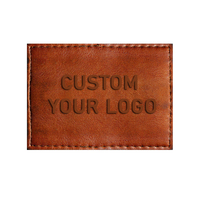 Fabricant d'étiquettes pour vêtements en jean, logo personnalisé, patchs en cuir véritable 3D gaufré, écologiques, vierges, en forme de rouleau, pour vêtements