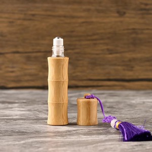 Rollo de diseño de nudo de bambú natural en botella 10ml Mini <span class=keywords><strong>Perfume</strong></span> de aceite esencial Botella a prueba de luz para aceite de esencia con borla - Product Image 4