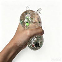 Balle anti-stress souple et scintillante en forme de chignon, jouet sensoriel mystère de Noël pour filles et garçons