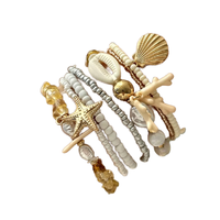Ensemble de bracelets bohèmes faits à la main pour femmes, en alliage de zinc, avec étoiles de mer, coquillages, coraux, perles imitation perle, thème océan