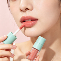 Flacon de brillant à lèvres en PETG transparent à paroi épaisse de 6,8 ml avec bouchon à vis et impression sérigraphique pour l'emballage de maquillage liquide (rouge à lèvres, blush)