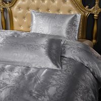 Couette européenne en coton jacquard satiné Broderie luxueuse 4 pièces Housse de couette géométrique Couvre-lit Drap de luxe