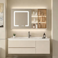 Meuble de salle de bain minimaliste style crème avec vasque en céramique intégrée, ensemble vasque et meuble sous-vasque