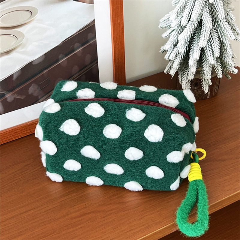 Woolen polka dot green in hand. pillow bag