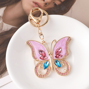 Portachiavi di Lusso con Farfalla Rosa in Strass, Ciondolo in Metallo Traforato, Charm Creativo per Borse, Gioielli da Donna, Anello Portachiavi per Auto, Vendita all'Ingrosso - Product Image 1