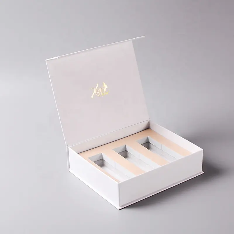 Caja de embalaje de kit cosmético personalizado de fábrica para aceite esencial cuidado de la piel loción papel de arte blanco EVA caja magnética