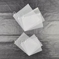 Vente en gros de chaîne de traction à anneau en plastique PP transparent givré personnalisé scellé pour vêtements et papeterie avec dessin animé
