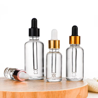 Flacon compte-gouttes en verre transparent de 30 ml, directement de l'usine, avec emballage en boîte sérigraphiée pour huiles essentielles, parfums, sérums cosmétiques