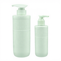Bouteille distributrice vide en plastique vert pastel clair avec deux types de pompe à pression, bouteille de lotion PET à rayures verticales avec pompe