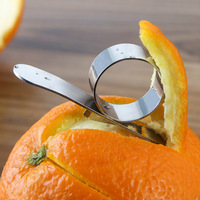 Éplucheur de fruits avec anneau en acier inoxydable, Gadgets de cuisine en gros, éplucheur d'oranges manuel