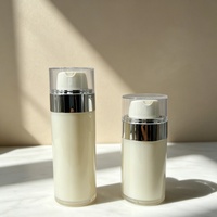 Flacon pompe sans air blanc nacré 30ml 50ml avec anneau argenté pour lotion et crème contour des yeux