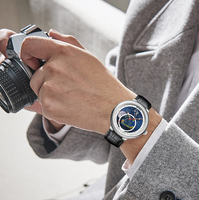 Nouvelles tendances Sport montres pour hommes en cuir de luxe Phase d'étoile squelette montre mécanique cadran bleu planète pour hommes