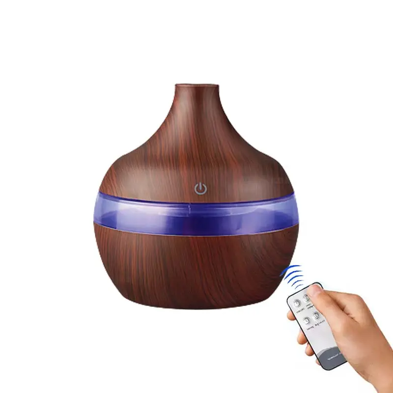 Umidificatore d'aria USB da 300ML diffusore di aromi elettrico nebbia olio di venature del legno aromaterapia Mini ha 7 luci a LED per auto Home Office