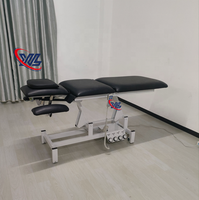 Xinman 2 Réglage de la hauteur du moteur Lit de beauté électrique Lit de traitement Lit de massage Conception de contrôle des pieds