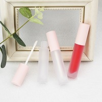 Tubes de brillant à lèvres roses personnalisés avec baguettes magiques vides et rondes Emballage en plastique de rouge à lèvres de 5ml de capacité