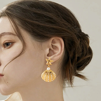 Boucles d'oreilles tendance été, style étoile de mer, pendentif en forme de coquillage incrusté de perles, boucles d'oreilles personnalisées pour fête à la plage