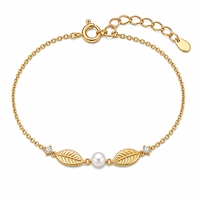 Bracelet pour femme en argent sterling 925 plaqué or, design feuille de zircon et perle, pierres latérales transparentes - Accessoire de mode, cadeau en gros