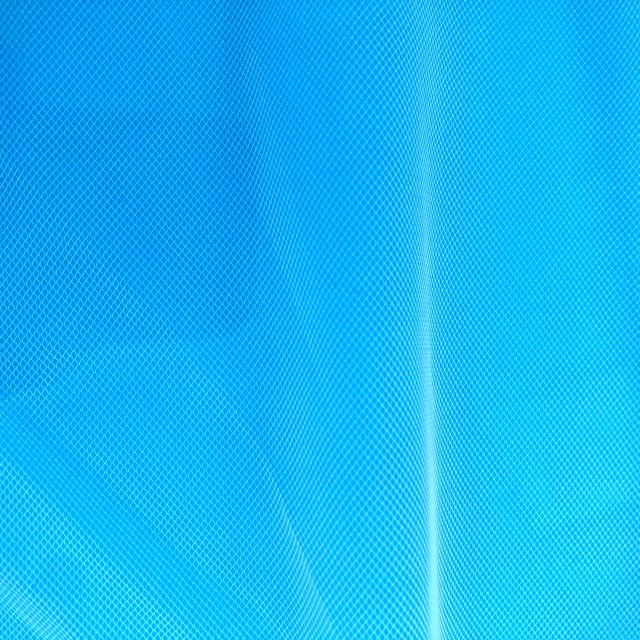 100% Nylon Textiles 30gsm Eco-Friendly Stretch Knitted Transparent Tulle Fabric for Wedding Dress