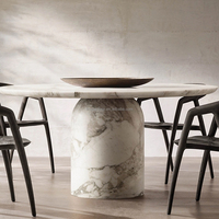 Ensemble de table à manger ronde avec plateau en marbre et design sculpté en forme de coupole, mobilier de salle à manger moderne et luxueux