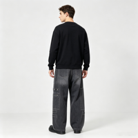Jean utilitaire chic pour homme, pantalon en denim noir délavé, coupe ample à jambe large, poches cargo, passants de ceinture, avec détail à bouton-pression