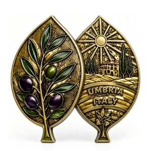 Médaille souvenir en laiton plaqué or d'Umbria, Italie, de forme irrégulière, avec impression en relief sur le thème des fruits, pièce de collection - Product Image 1
