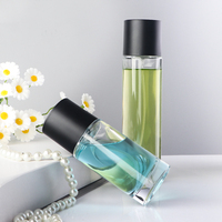 Desain baru botol parfum kaca silinder topi hitam botol semprot parfum bulat kosong 100ml 50ml wadah kaca untuk parfum