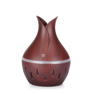 Mini Difusor de Aroma con Apariencia de Pétalos de Flores y Textura de Madera, Humidificador USB con Luz LED para Uso en Casa y Oficina - Product Image 1