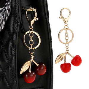 Porte-clés de luxe en résine en forme de cerise pour sac à main, accessoires de sac pour femme, vente en gros - Product Image 1